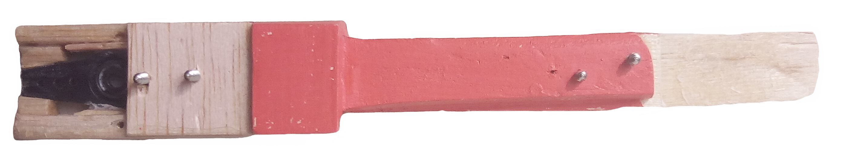One of the hand-cut balsa wood links