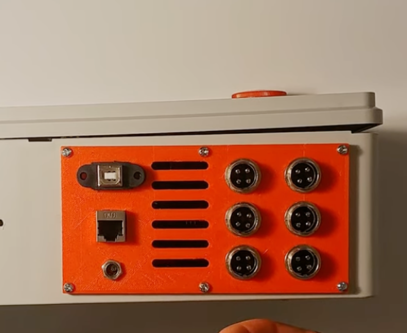 The side panel of the control box: USB-B, RJ45, a 5 V jack, ventilation slots and six GX16 motor connectors